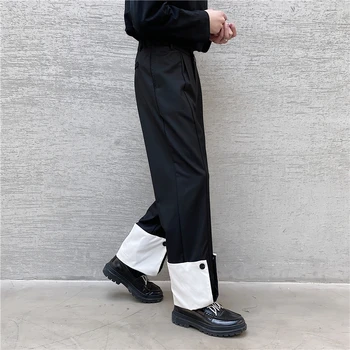 Na jar, pánske čierne a biele kontrastné patchwork nohavice dizajn bežné módny trend veľké nohavice